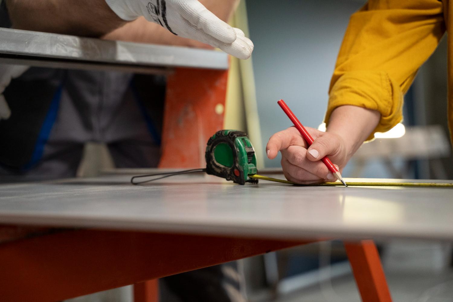 Tiler working on the renovation of the apartment